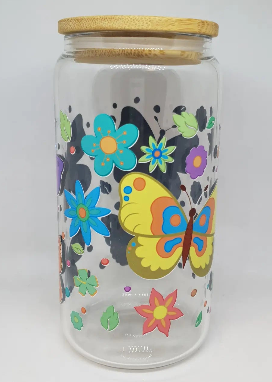Glass jar with colorful butterfly and flower design