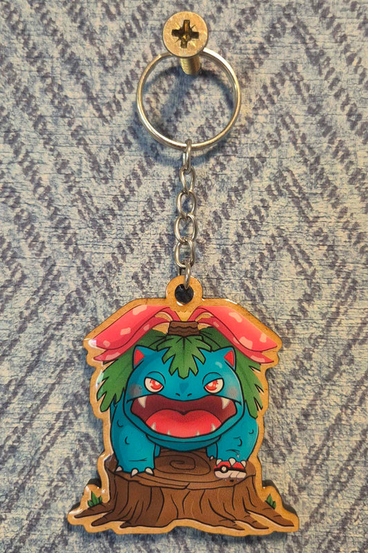 Keychain with a cartoon character on a textured fabric background