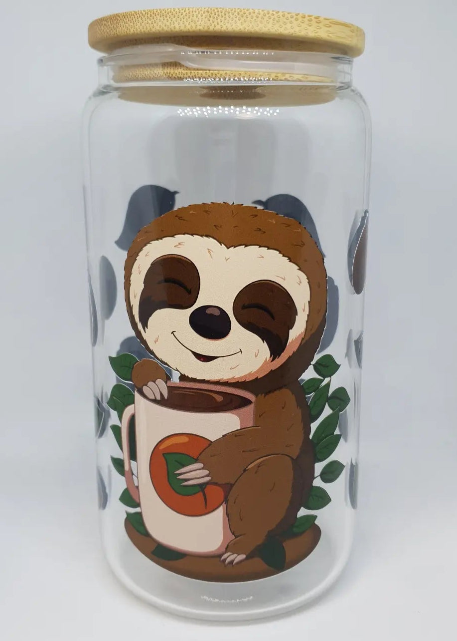 Glass jar with a sloth design and wooden lid on a white background