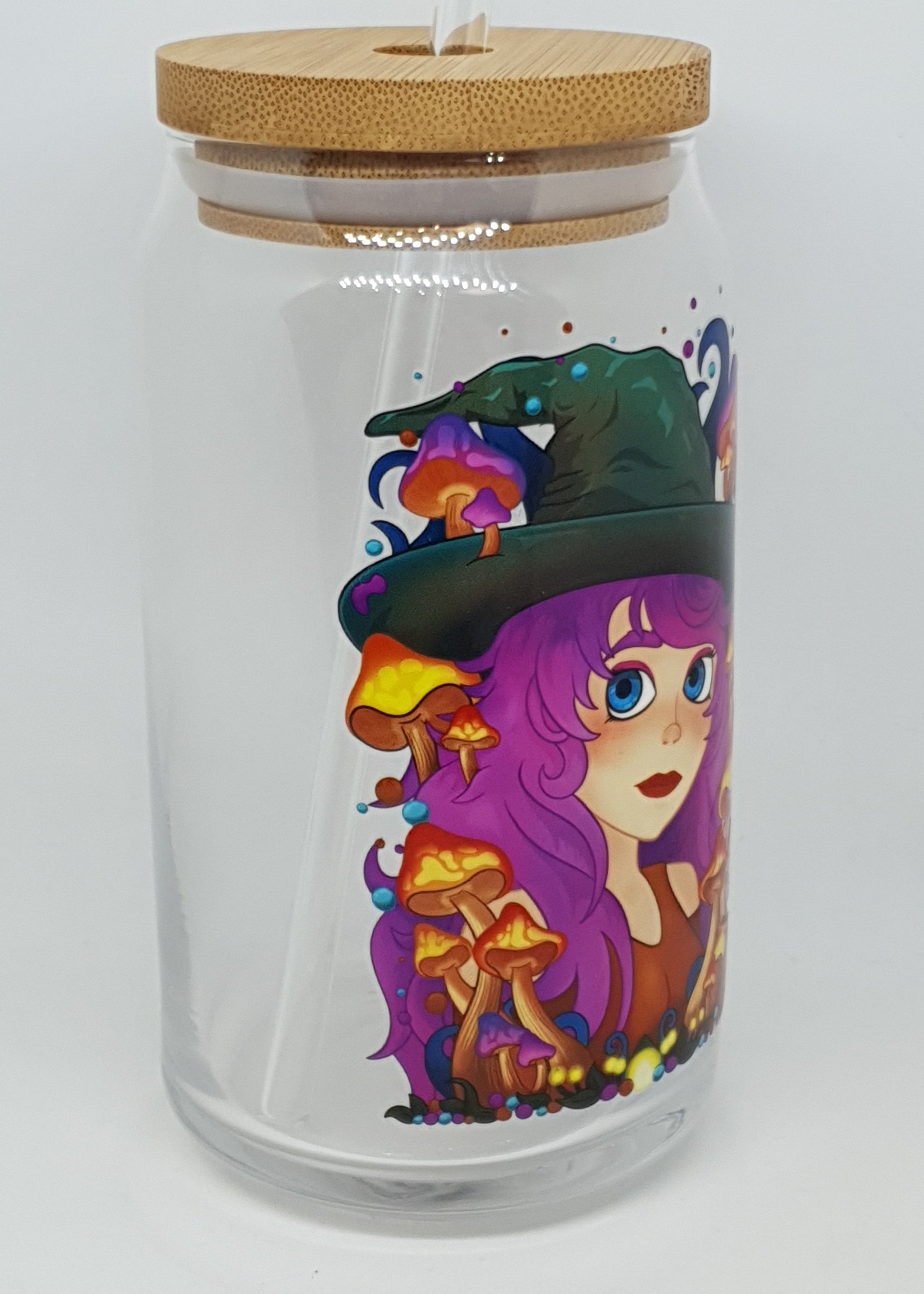 Colorful glass tumbler with a cartoon design on a white background